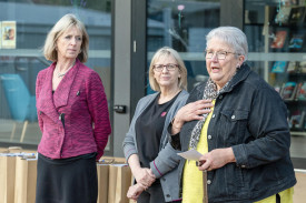 Rhonda Huf (right) speaks to the crowd with Kaylene Pietsch (left) and Amanda … ….