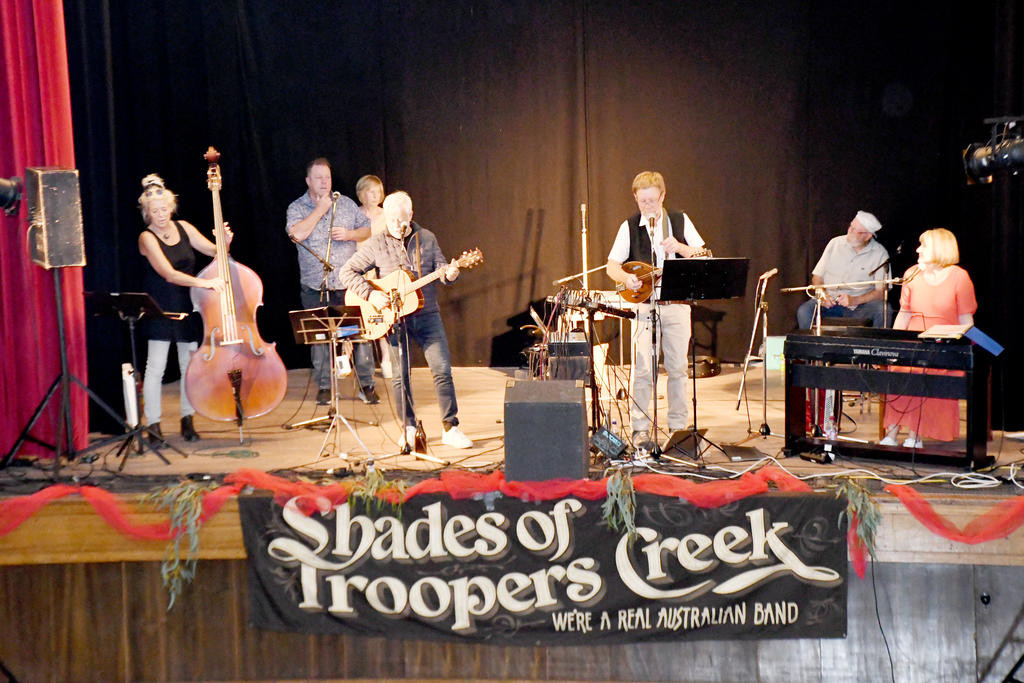 Shades of Troopers Creek reunite for some bush dancing. Band members are Dianne Krelle (bodhran and percussion), Herb Krelle (vocals, guitar and mandolin), Andrea Phelan (vocals, piano and accordion), Leigh Hinch (harmonica and accordion), Rick Stephens (vocals, guitar and mandolin), Barbara Muller-Pollack (double bass) and Ross Warrick (spoons).