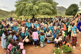 The Harvest Church Team with children at Oringowelo Primary School Abim.