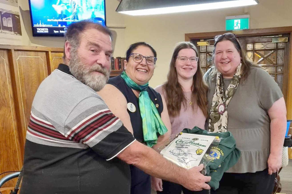 Mark Maltry, V2 District Governor Michelle Challis, Emma Maltry and Green Park Lions President Carolyn Maltry.