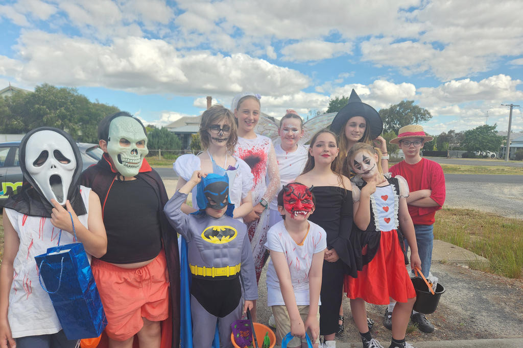 A group of Halloween Trick or Treaters roam the streets of Dimboola as they visit participating houses.