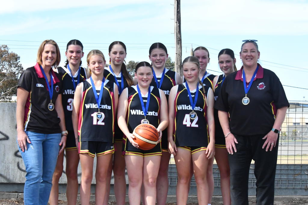 The Wildcats winning under-16 girls team.