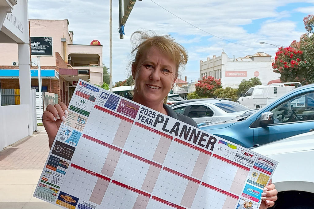 Wimmera Mallee News sales representative Dee Devlin shows off the Warracknabeal Herald's yearly planner.