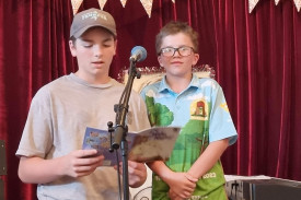 Edison Stasinowsky and Kolby Bigham reciting the Christmas Story in poetry form.