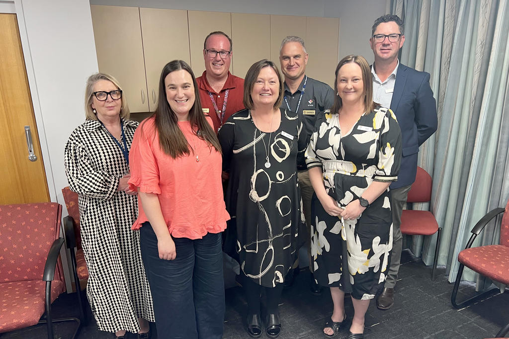 (From left) Executive director clinical services Cheree Schneider, executive director business and strategy Melanie Albrecht, executive director community health Rhys Webb, executive director finance and administration Janette Lakin, executive director quality and safety Darren Welsh, board president Katherine Colbert and CEO Ritchie Dodds.