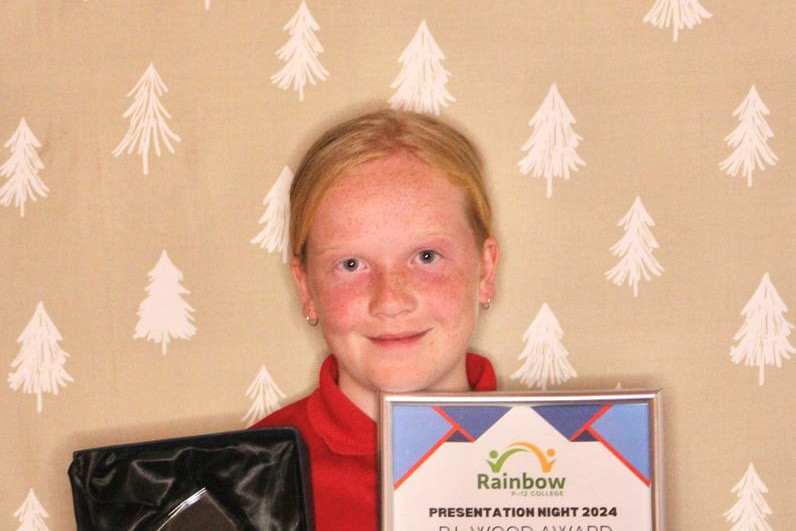 Adalyn Clugston of Year six with the PL Wood award.