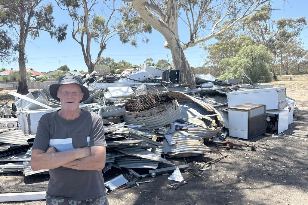 Dimboola Lions Club president Rod McKenzie in front of the scrap metal site.