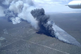 Firefighting aircraft attack fires started by dry lightning in Little Desert National Park on Monday.