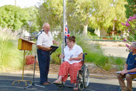 Hindmarsh Shire mayor Ron Ismay presents Allira Roberts with her award.