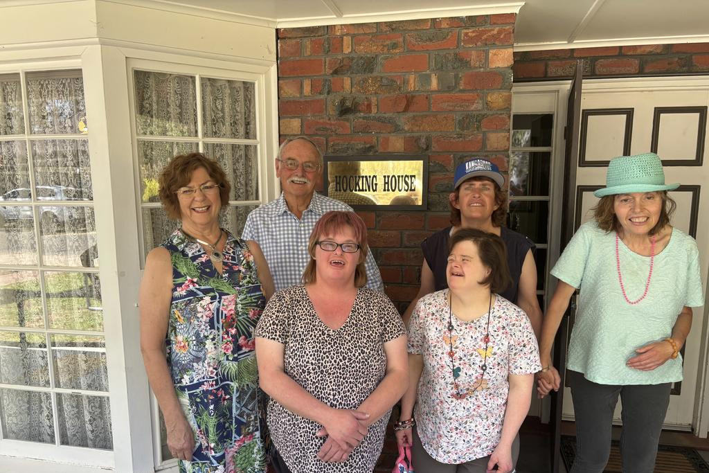 Glenda and Peter Hocking with Hocking House's newest residents, Suzie, Tash, Lisa and Jennifer. Photo: CAITLIN MENADUE