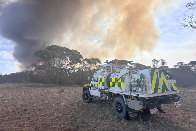 Firefighters battle the blaze at Little Desert National Park.