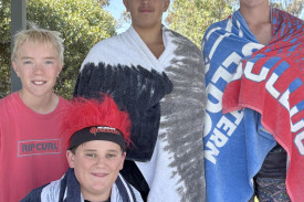 William McCurdy, Zac Preston, Buta Beney and campbell Mansfield smile as they wait for their race. Photo: CAITLIN MENADUE