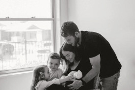 Robbie and Sarah Miller with their children.