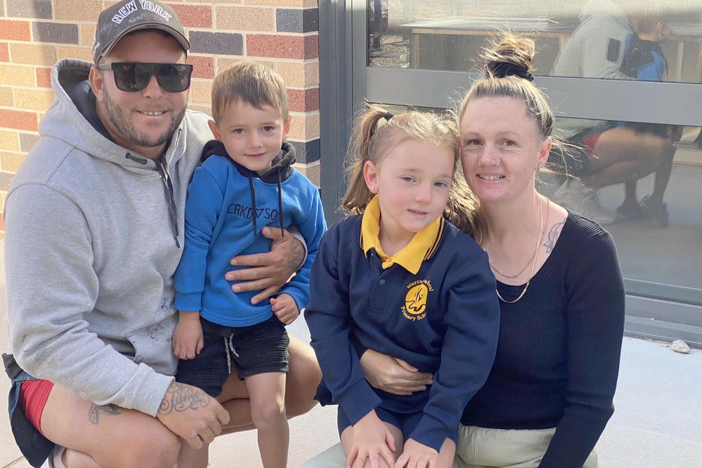 Arlo G with dad Daniel, brother Kaiden and mum Melinda on her first day of Prep. Photos: JANE STEIN