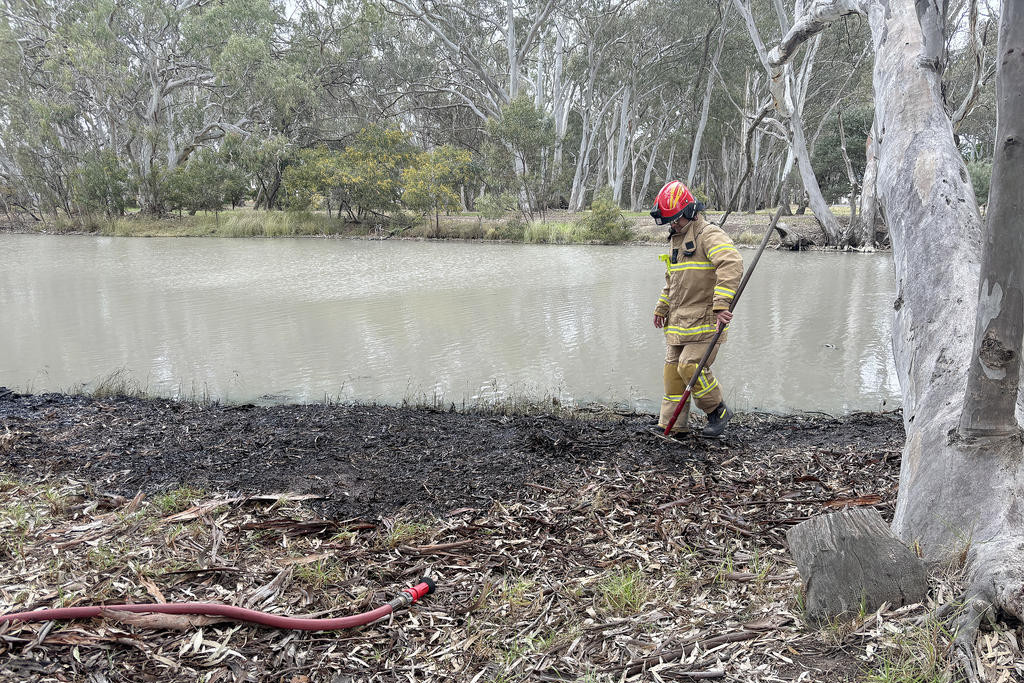 Warracknabeal Fire Brigade attended a fire along Yarriambiack Creek in Craig Avenue last year which was believed to have been started by a campfire that hadn't been fully extinguished. Photo: CAITLIN MENADUE