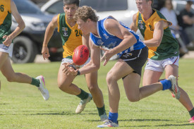 Ryder Hudson of Minyip Murtoa gathers a loose ball.