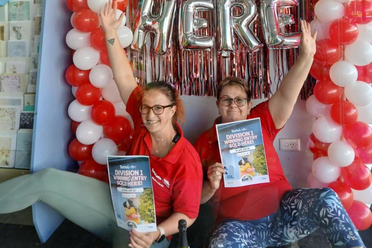 Jane Johnston and Samantha Russell celebrate a Division One ticket being sold at Stawell Lotto.