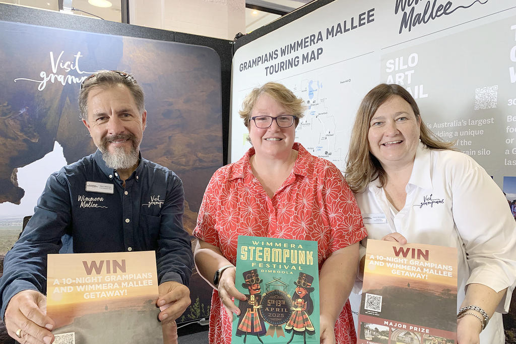 Grampians Wimmera Mallee Tourism CEO Marc Sleeman, Yarriambiack Shire councilor Karly Kirk and Grampians Wimmera Mallee Tourism partnerships manager Kerrie Mulholland promoted Grampians and Wimmera Mallee region at the Victorian Caravan and Camping Show in Melbourne Showgrounds. Photo: DAVID WARD