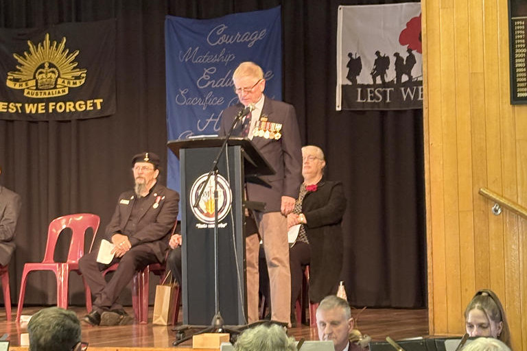 Martin Wettenhall addresses the crowd during the Anzac Day commemorative service.