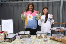 Zahra and Larnie sell biscuits at Tesso’s.