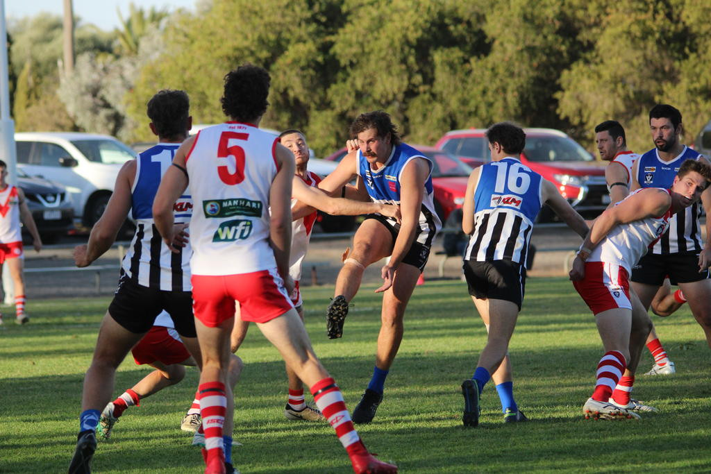 Dusty Cross kicks.