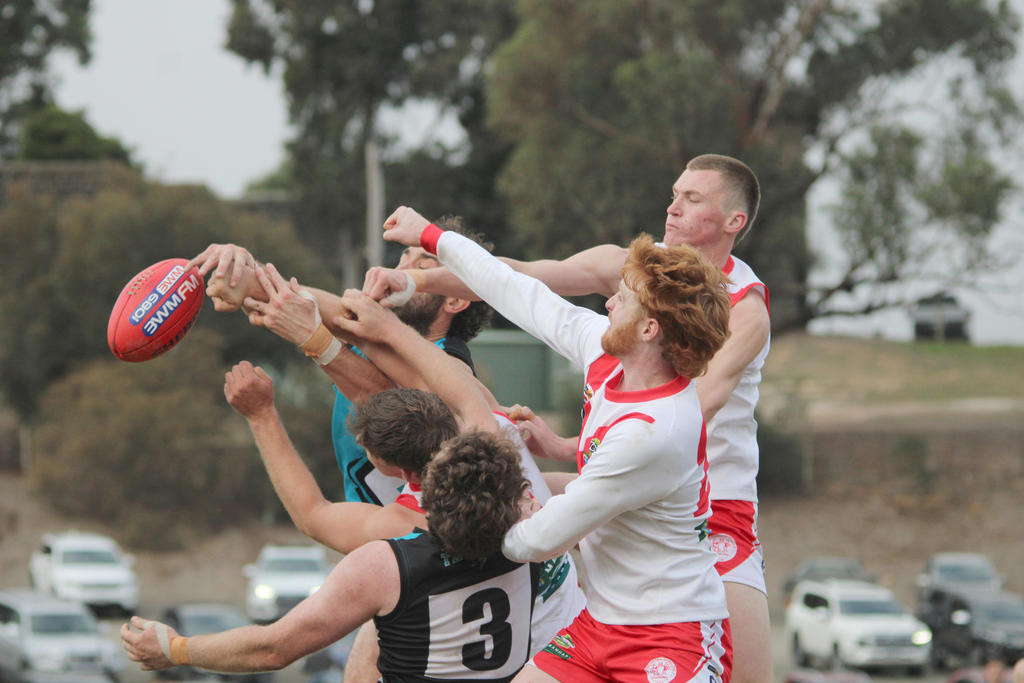 A pack of players contests the ball during the Ararat v Thunder clash on Saturday.