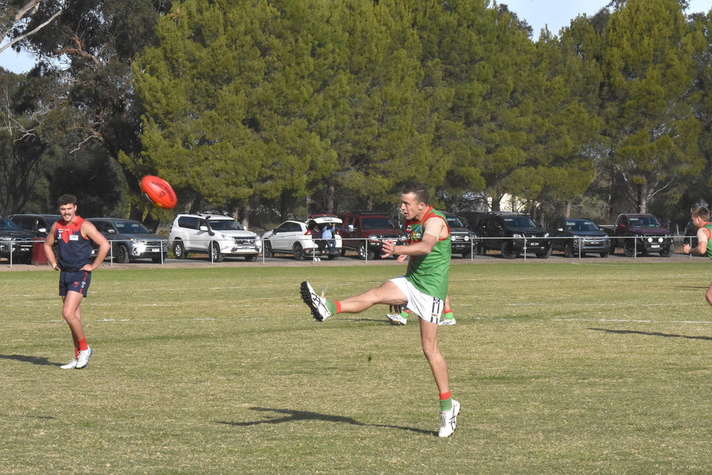 Noradjuha Quantong's Leigh Stewart kicks for goal.