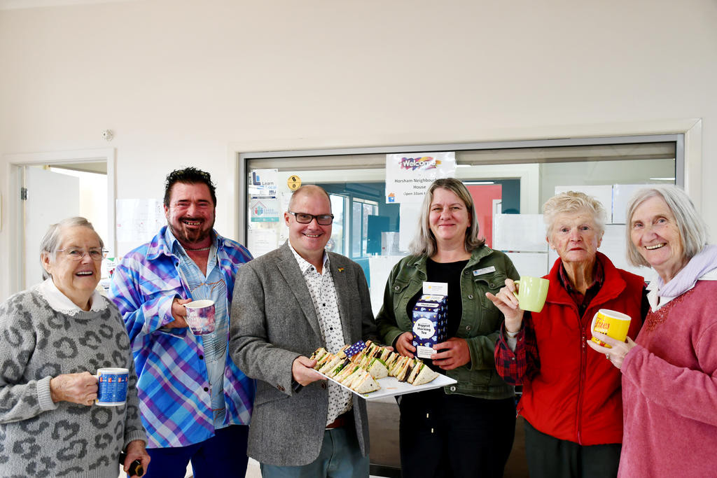 Eileen Robinson, Scott Neill, Horsham Neighbourhood House manager Charlie Helyar, administrator Bobbi Wade, Kola Kennedy and Joan Helyar enjoy a cuppa and finger food at the Biggest Morning Tea. Photo: CAITLIN MENADUE