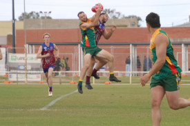 Simon Hobbs takes a mark for Dimboola in their game against the Demons on Saturday.