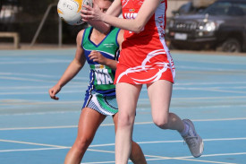 Taylors Lake’s Zoe Gray receives the ball mid-court.