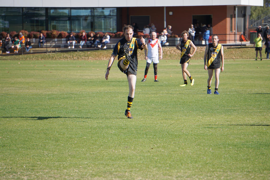 Wimmera Whippets' Callum Barnes kicks long.