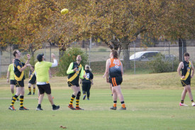 Kim Kendrik and Charlie Blake contest the ruck.