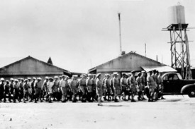 The ship’s company marches across HMAS Magnetic.