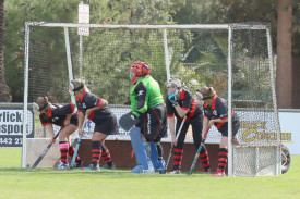 The Horsham Jets’ defence is set to defend a penalty corner.