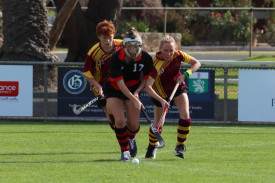 Horsham Jets’ Annabelle Heal leads in a race for the ball ahead of Warracknabeal’s Sam Williamson and Jess Boyd.