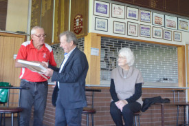 Jim Geltch presents Wavell McPherson with the award.