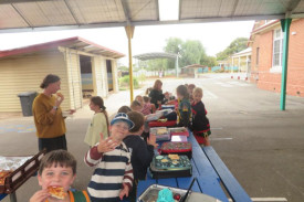 Students enjoying a pizza lunch, thanks to the Hindmarsh Shire.