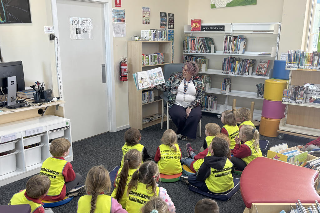 Yarriambiack Shire Council's Sarah-Jayne Holland reads 'The Truck Cat' to Warracknabeal Kinder students and storytime attendees for National Simultaneous Storytime. Photo: CAITLIN MENADUE