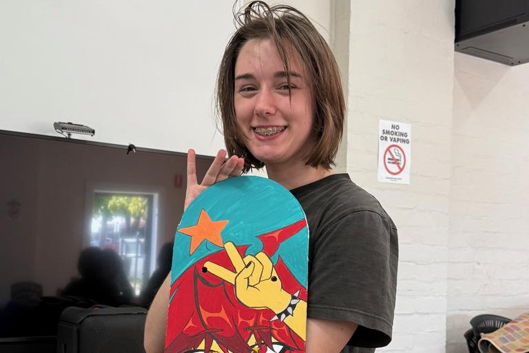 Max Lantzakis shows off one of the final skateboard designs. Photo: HRCC