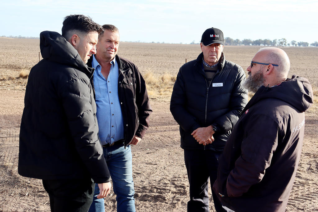 Drought Response Task Force member Shane Sali, left, Horsham Rural City Council Cr Brian Klowss, mayor Ian Ross and Laharum farmer Sam Eagle talk about the challenge farmers face during a tour on June 5. Photo: SHERYL LOWE