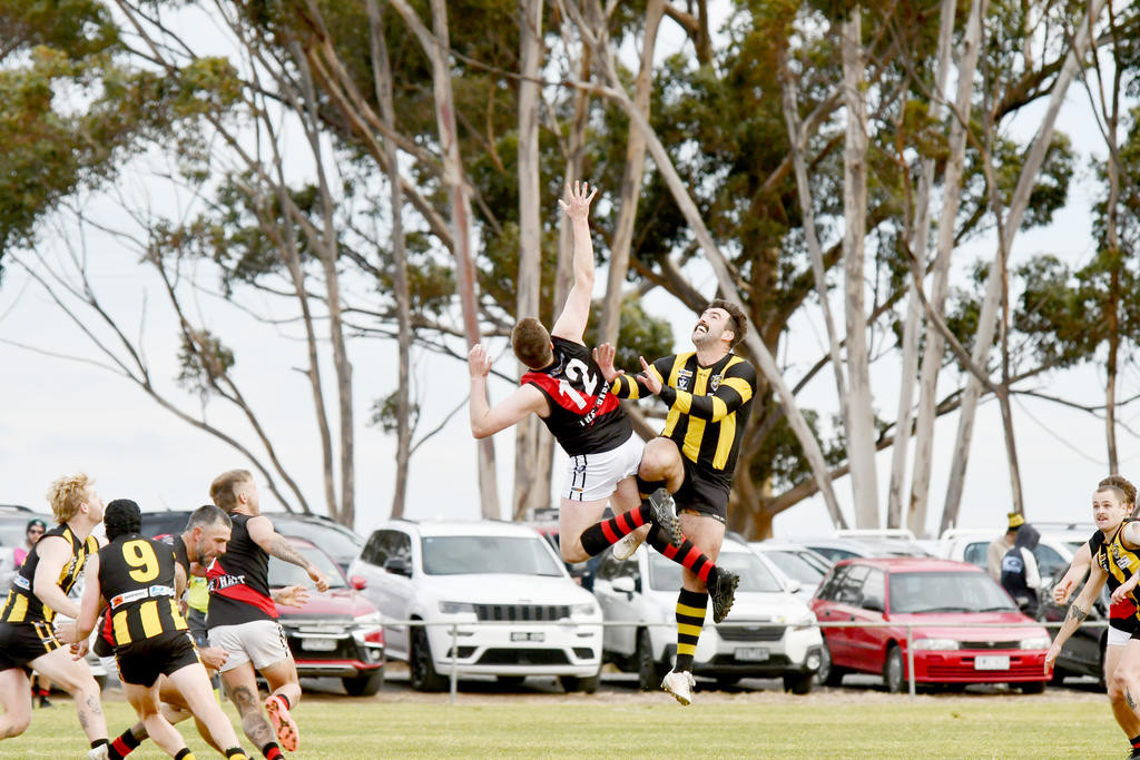 Jack Vague and Matt Healy do battle in the ruck during the Noradjuha Quantong and Pimpinio HDFNL clash on Saturday, 14.