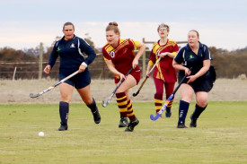 Warrack’s Eileen Eichberger leads a group of players in a race for the ball.