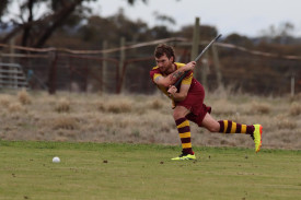 Warrack Hoops’ Jayden Smith launches the ball into attack.