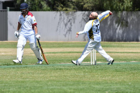 Scott Marks of the Horsham Tigers steps in to bowl.