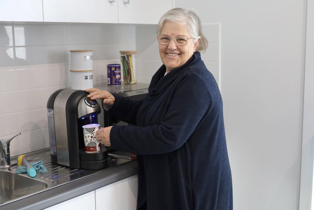 Kate Hudson is all smiles while making a cuppa during the cuppa connections session on Wednesday, June 11, at the Rainbow Library.