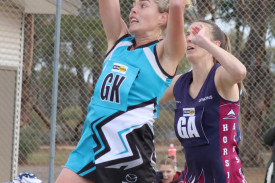 Sydney Thorogood intercepts the ball in front of Georgia Batson.