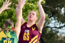 Eagles goal shooter Amber O’Connor tries to ignore Dimboola goalkeeper Bridget Dorrington.