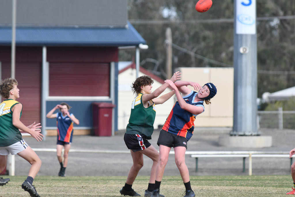 Student from St Brigid's and Ararat contest the bounce.