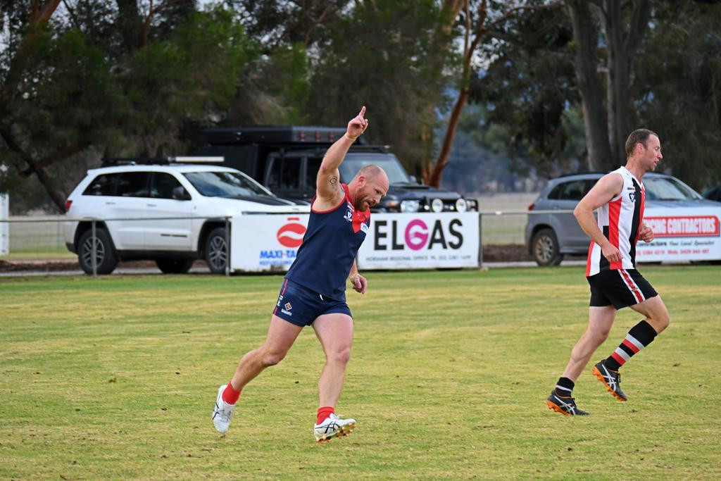 Laharum's Phil Butsch celebrates one of his five goals against Edenhope-Apsley during the Demons' 78-point win.