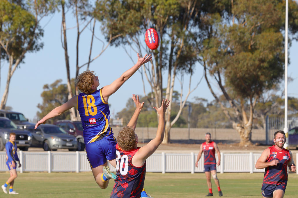 Natimuk's Drew Harris leaps for the ball.